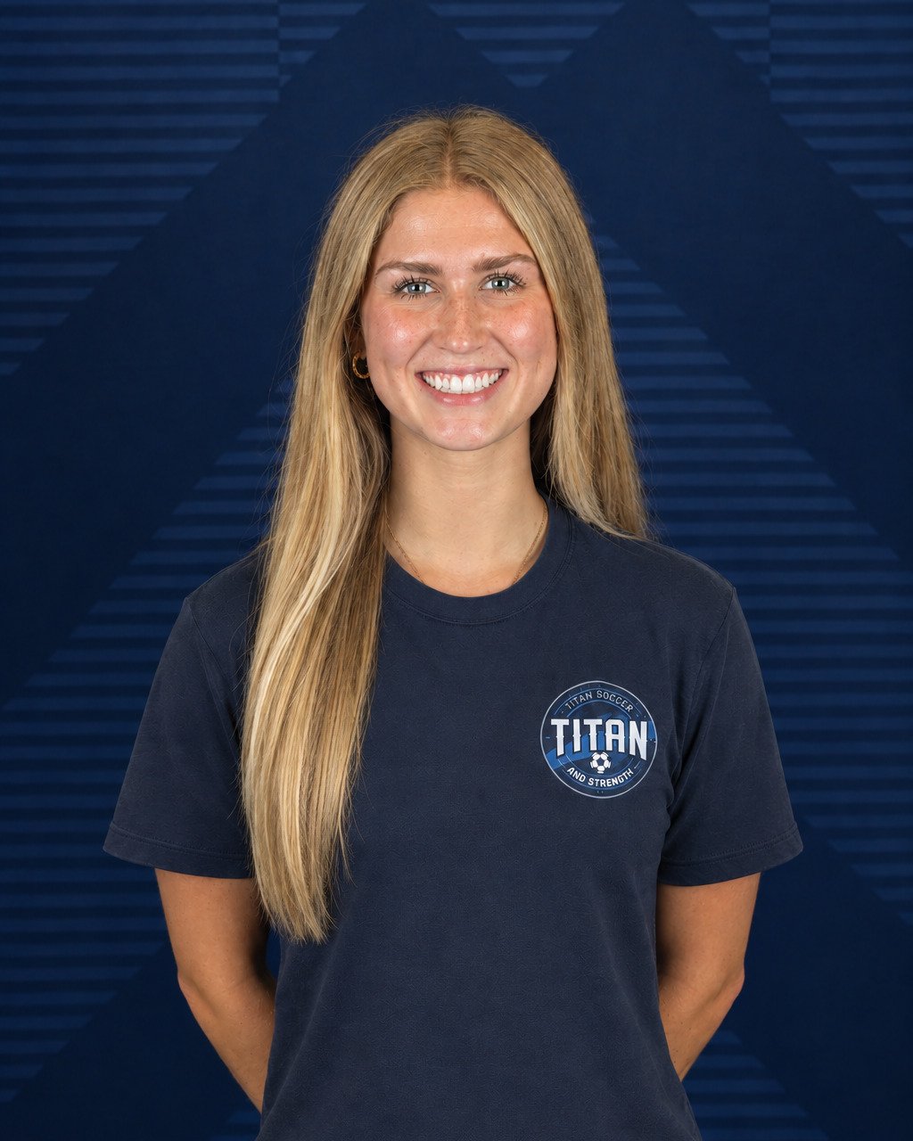 Coach Ashley Hagadorn in a Titan Soccer and Strength shirt